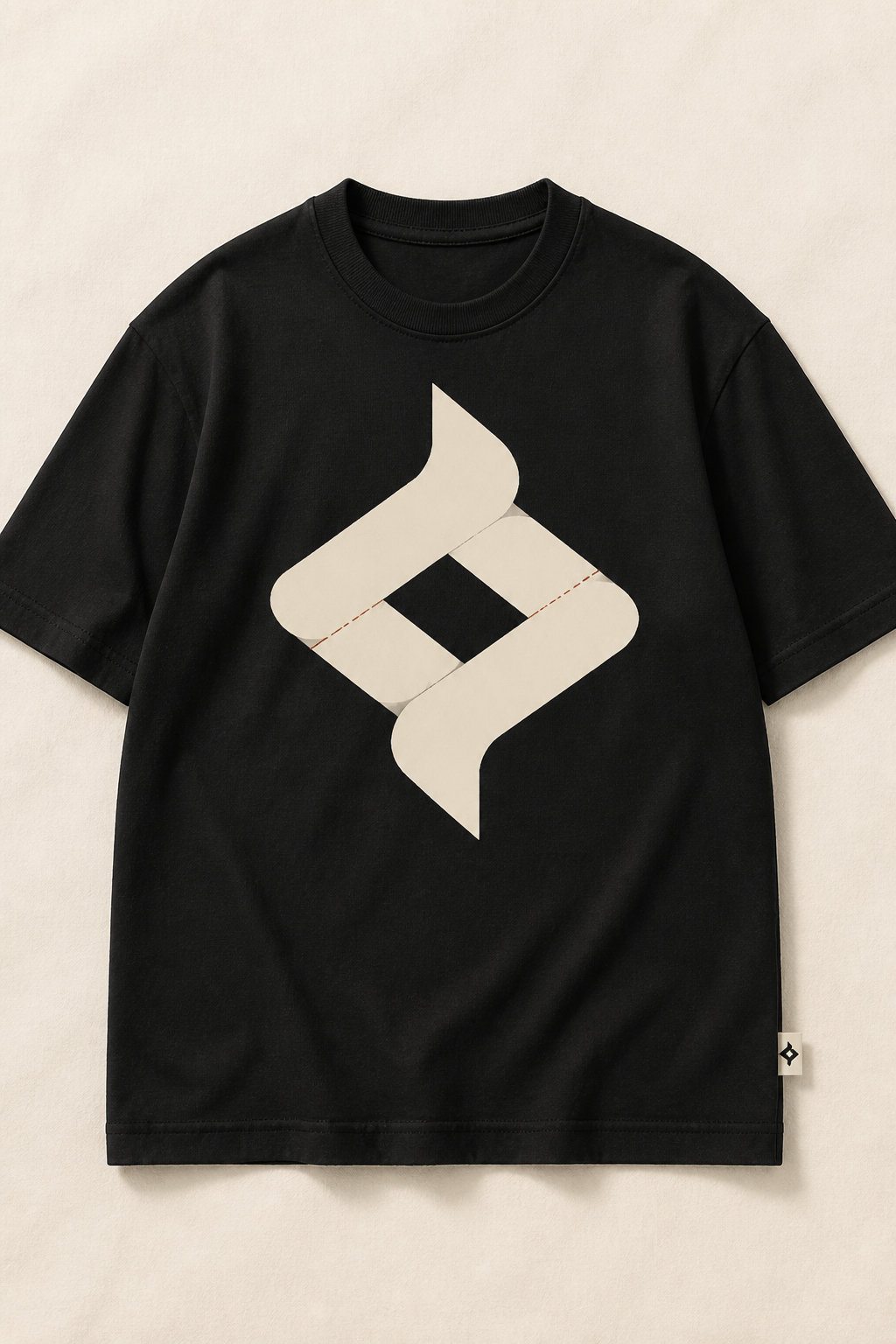 Me&yours The Exchange tee — cream fold mark printed on a black shirt